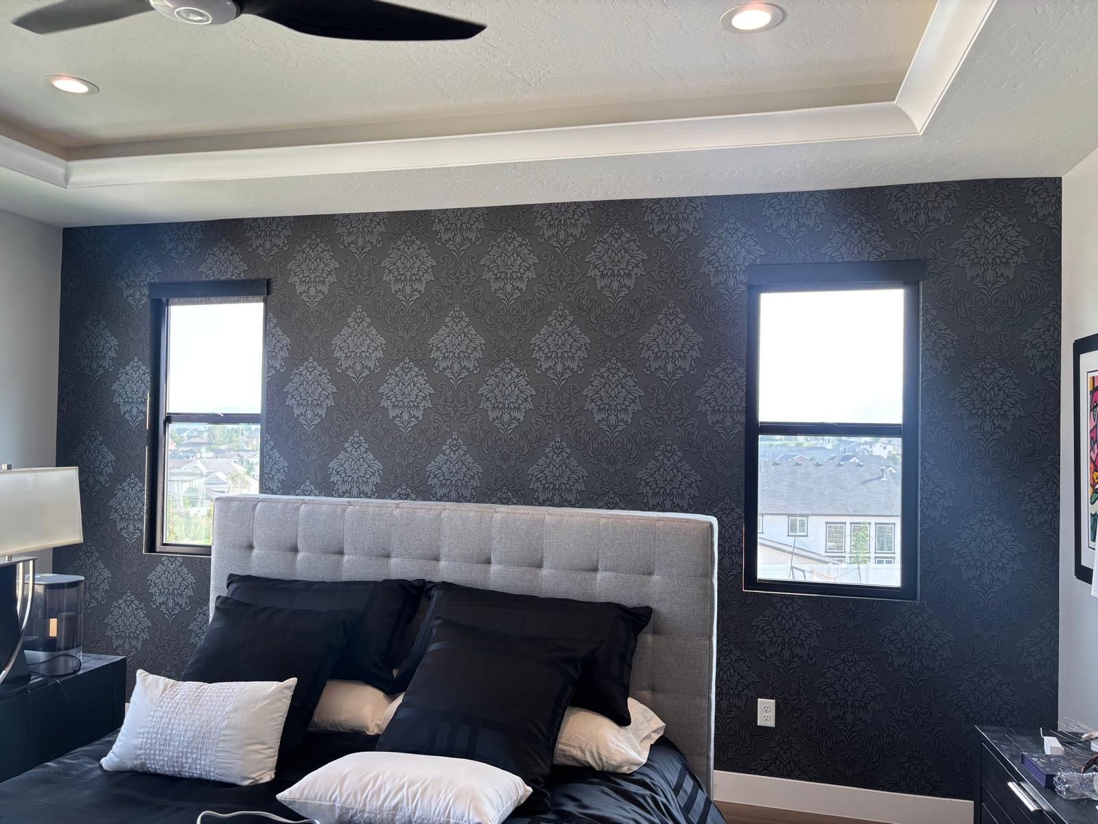 Dark damask wallpaper in a bedroom